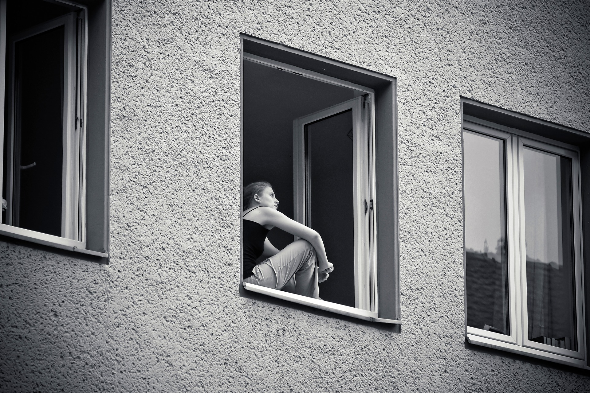 Girl looking out of a window
