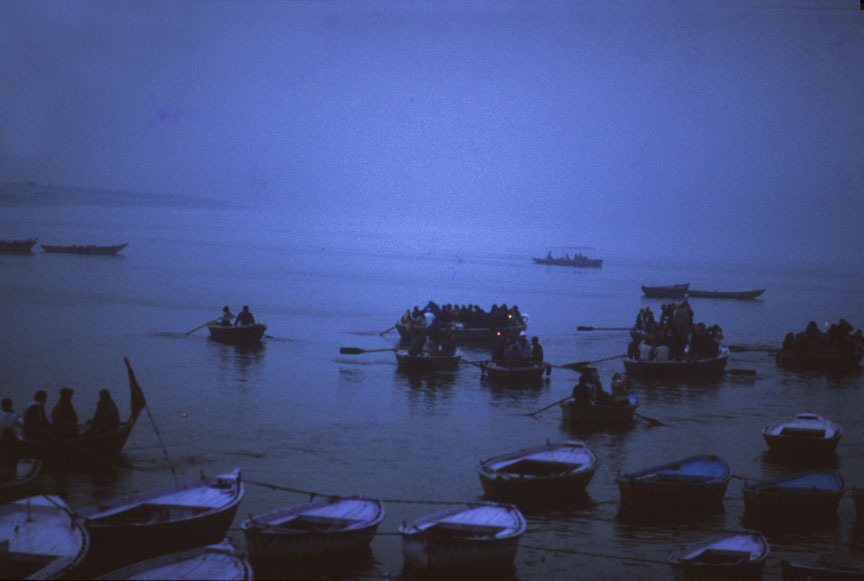 Country boats sail in the misty blue dawn. Photo: Sugato Mukherjee