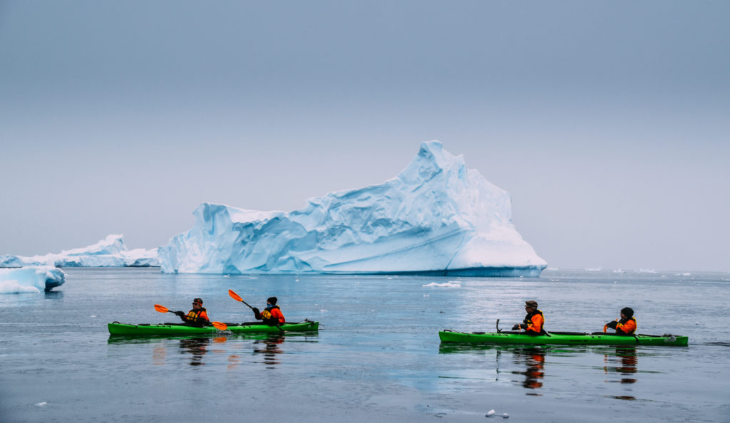 Antarctica by kayak photo courtesy of Rax from NomadsUnveiled.
