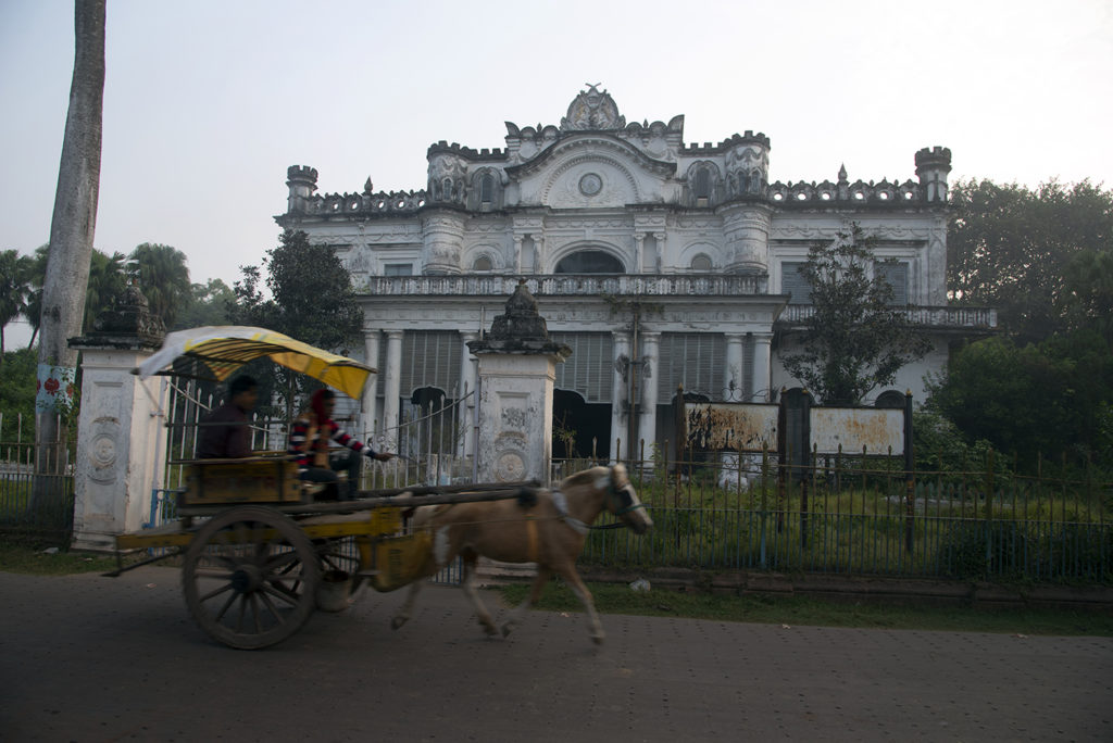 A-horse-drawn-carriage-popular-mode-of-tourist-transport-in-Murshidabad-runs-in-front-of-Wasif-Manzil