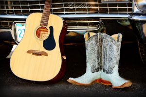 Country music with guitar and boots