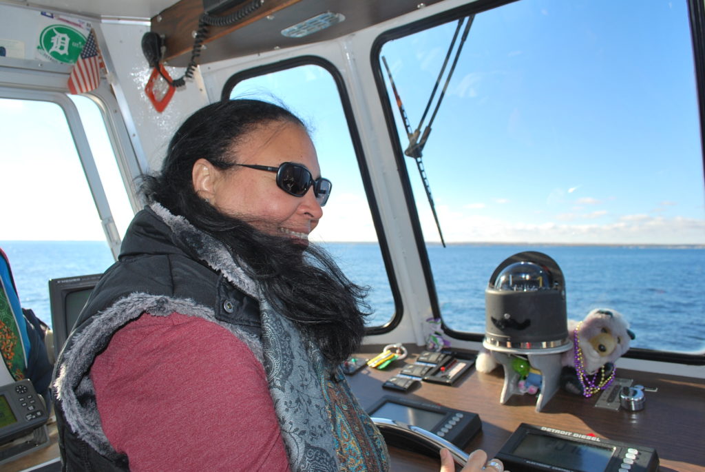 Tonya steering Mackinac Island ferry