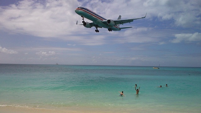 Caribbean plane and swimmers