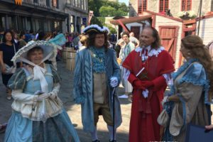 New France festivalgoers dressed in period costumes