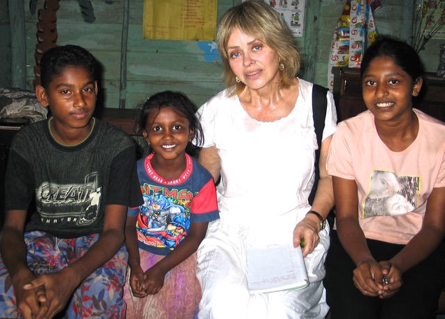 The author with two Sri Lankan students and teacher, right. Photo: Tim Leland