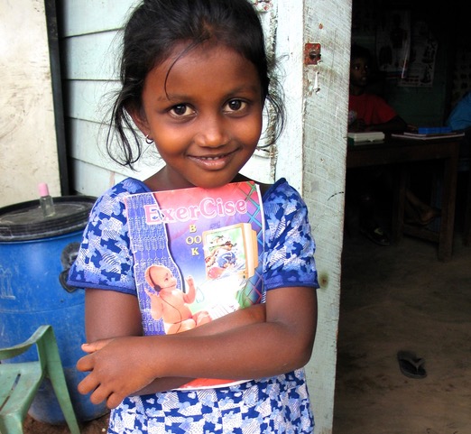 Sri Lankan girl waits for her teacher. Photo: Julie Hatfield