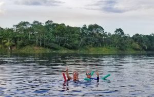 Author swimming in the Amazon. Photo: Patti Morrow