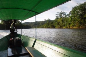Ecuador Amazon. Driver on the river.