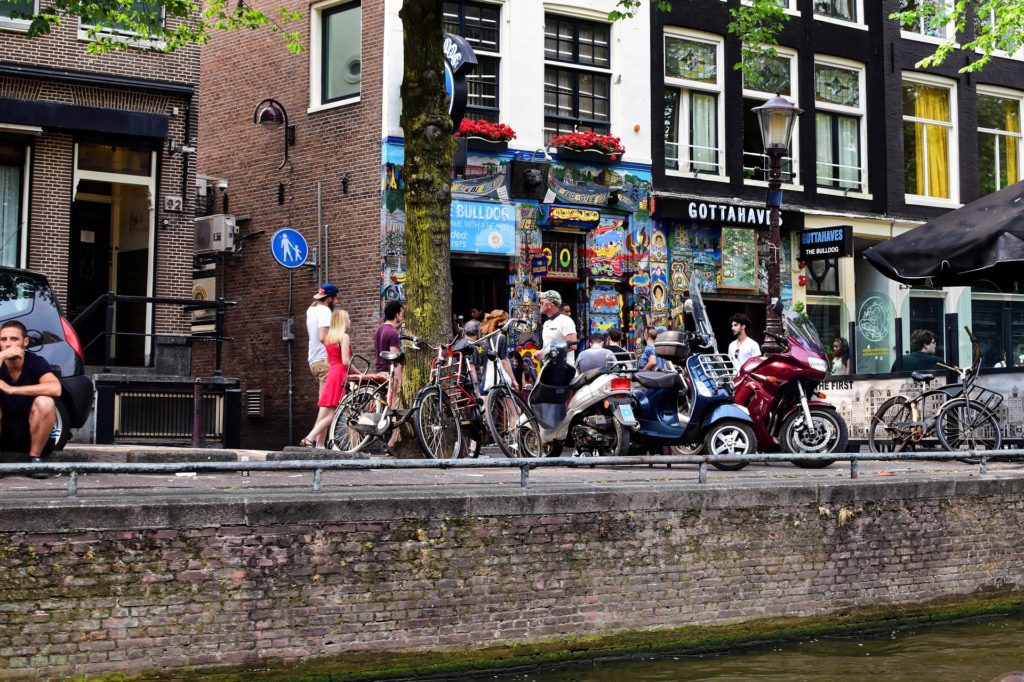 Amsterdam where motor scooters and bicycles collide.