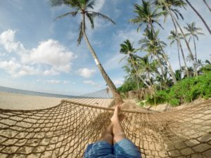 Relaxing on a beach hammock