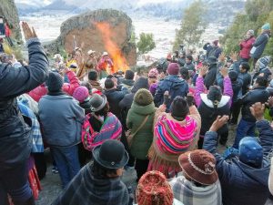 Photo credit: Renee Alexander / Sun worshipers welcome the Winter Solstice sunrise with raised hands and open hearts.