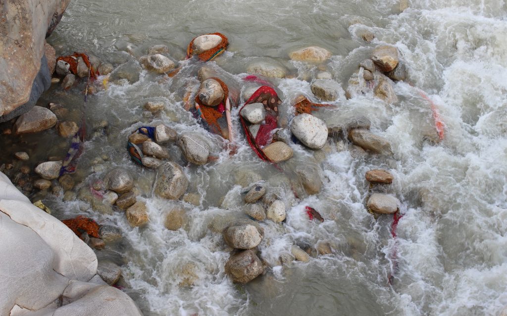 Articles of clothing and saris lost to the river by ritual bathers. Photo: Trixie Pacis