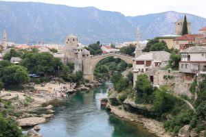 Mostar Bridge, is a rebuilt 16th-century Ottoman bridge in the historic city center of Mostar in Bosnia and Herzegovina that crosses the river Neretva and connects the two parts of the city.