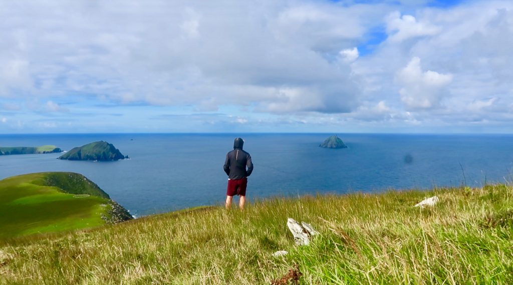 Derek Cullen overlooking the habor on the Great Blasket Island in Irleland
