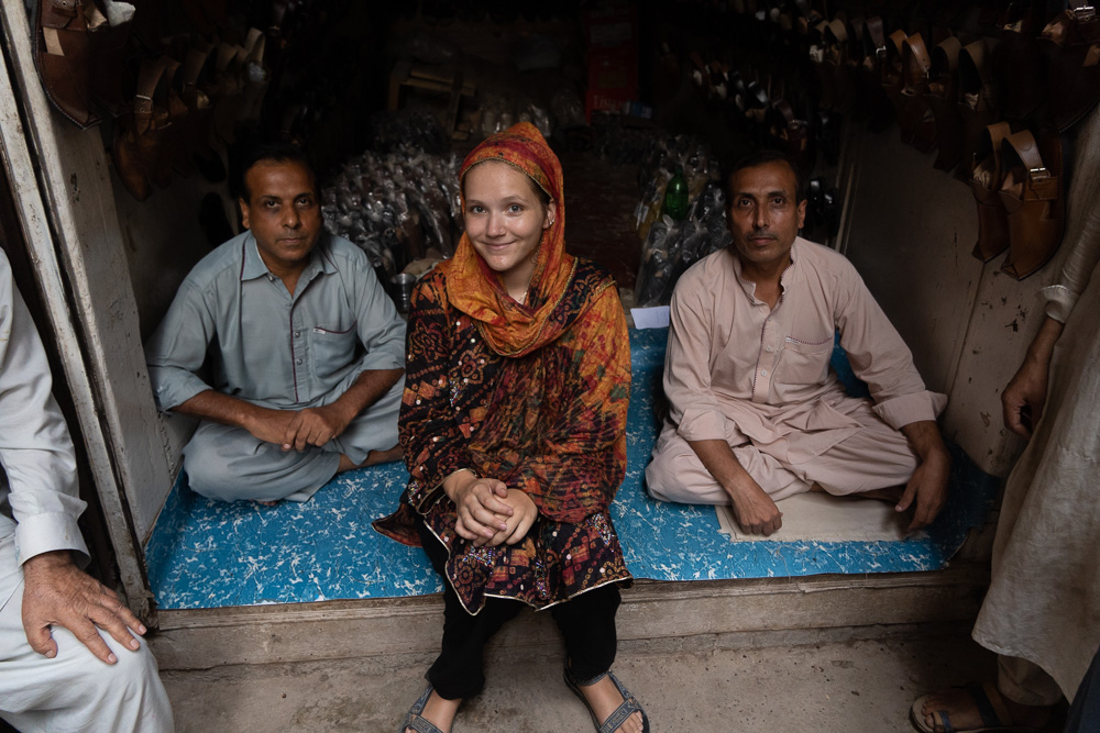 Pakistan - Author with some friendly shoemakers who invited her for tea in peshawar. Photo: Samantha Shea