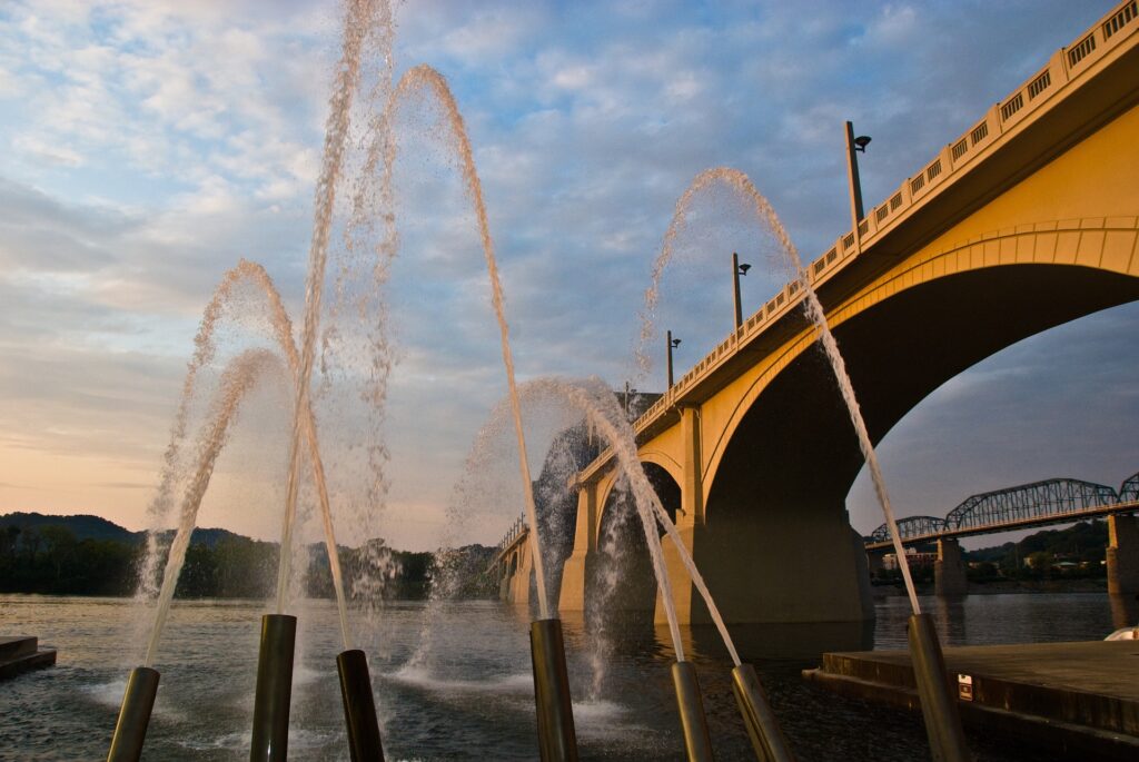 Chattanooga bridge at sunset with water canons