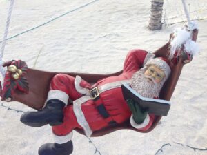 Santa Claus at Christmas on the beach
