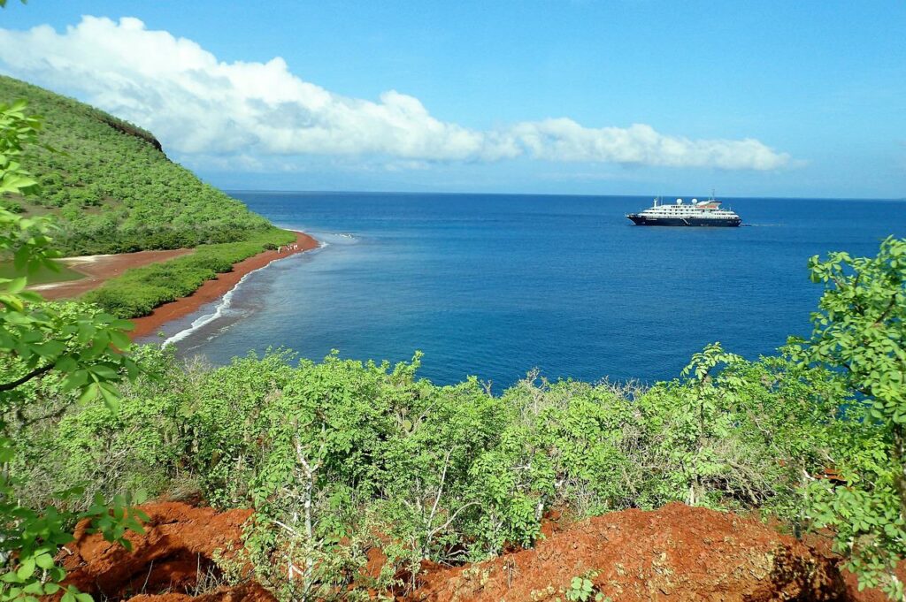 galapagos-islands-with-small-cruise-ship-off-the-coast