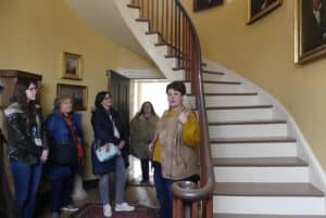 Our docent, Gina, shows us the cantilevered staircase. Photo: Kathleen Walls