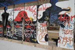 Front of sections of the Berlin Wall that showcases art and messaging. These sections sit on the grounds of the Churchill Museum. Photo: Tonya Fitzpatrick