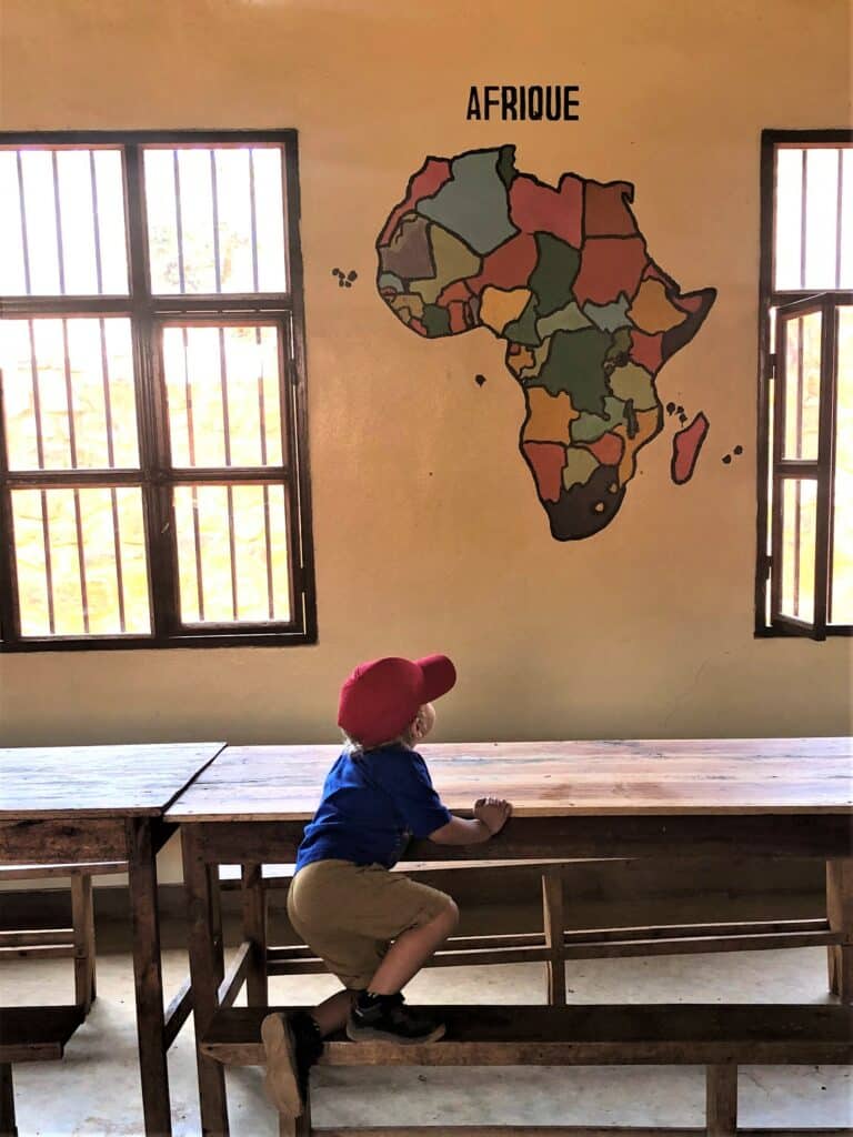 Author's son in the cafeteria of Gisuru School for the Deaf. Photo credit Breana Johnson