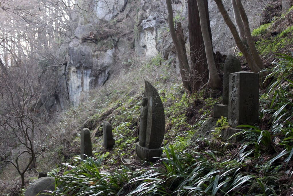 Stone sculptures, scattered throughout the forest surrounding the Yamadera Temple hiking trail. Photo:  Thomas Später 