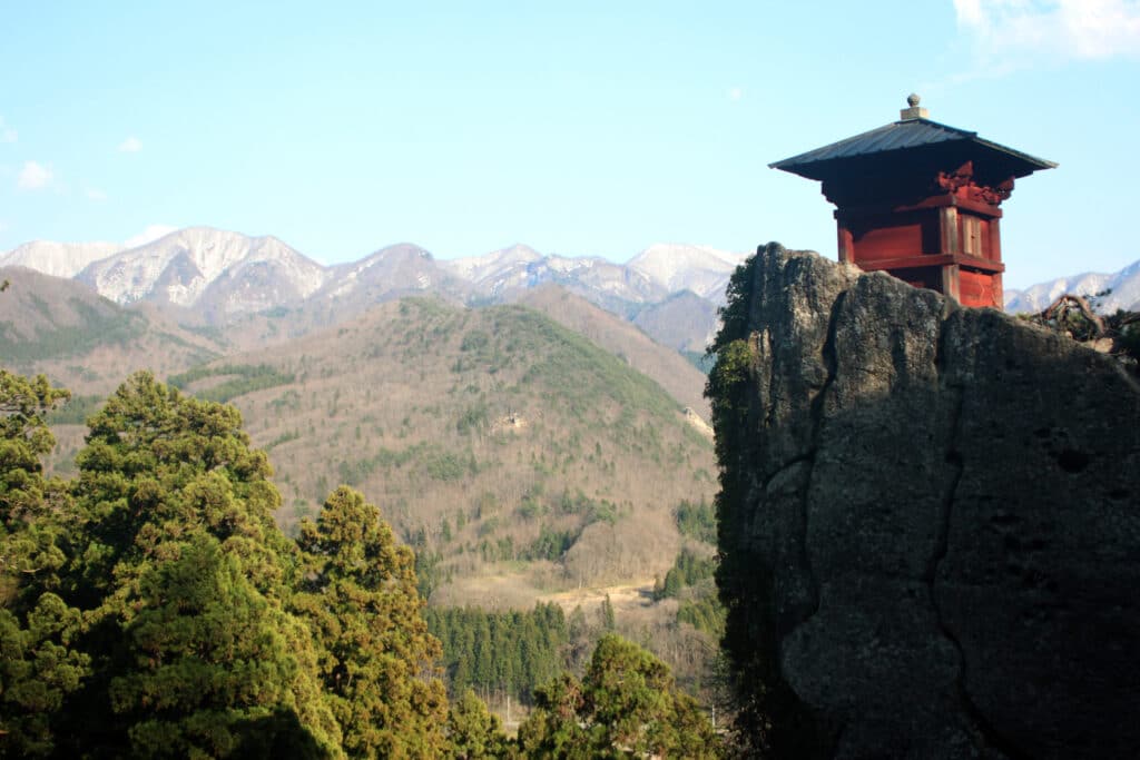 Red Hall hut majestically sitting on a rocky cliff, overlooking Yamadera Valley. Photo:  Thomas Später 