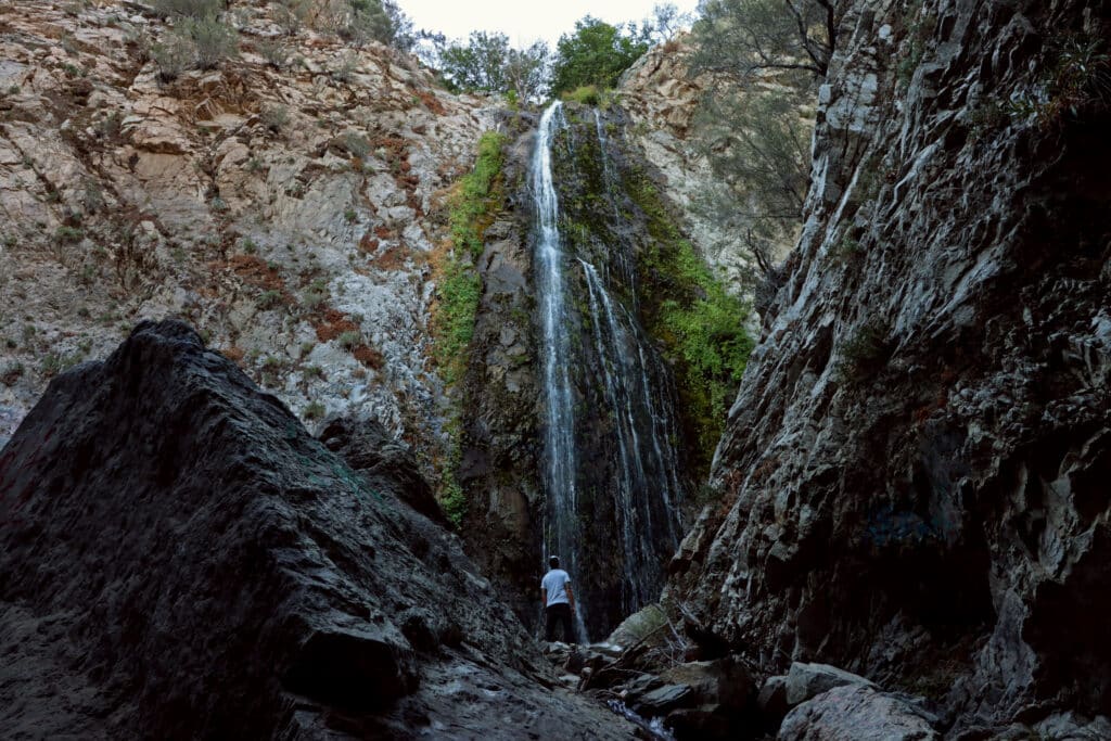 Author standing in front of 100-foot high Bonita Falls.  Photo: Thomas Später