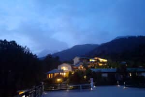 Darkness descends gently over Rakkh Resort with the inly blue Shivalik Range in the backdrop