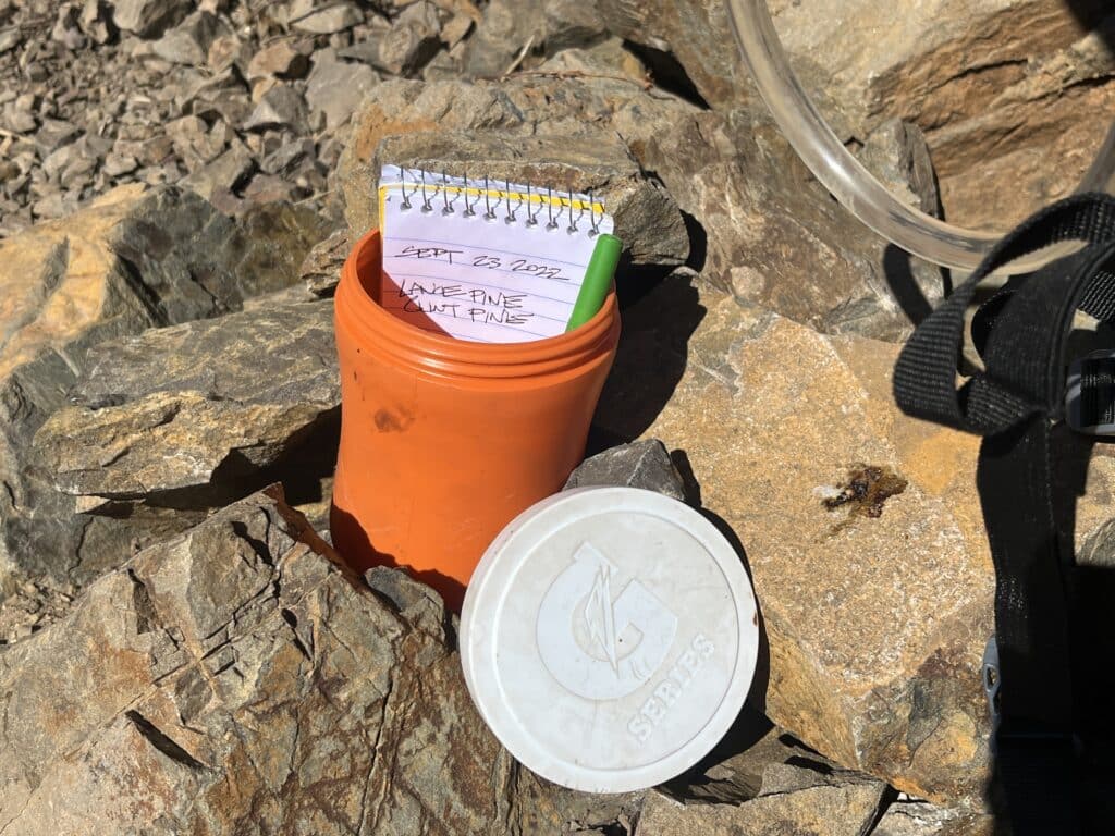 Container with paper and pen, located at Bedford Peak to log arriving hikers by name and date. Photo: Thomas Später