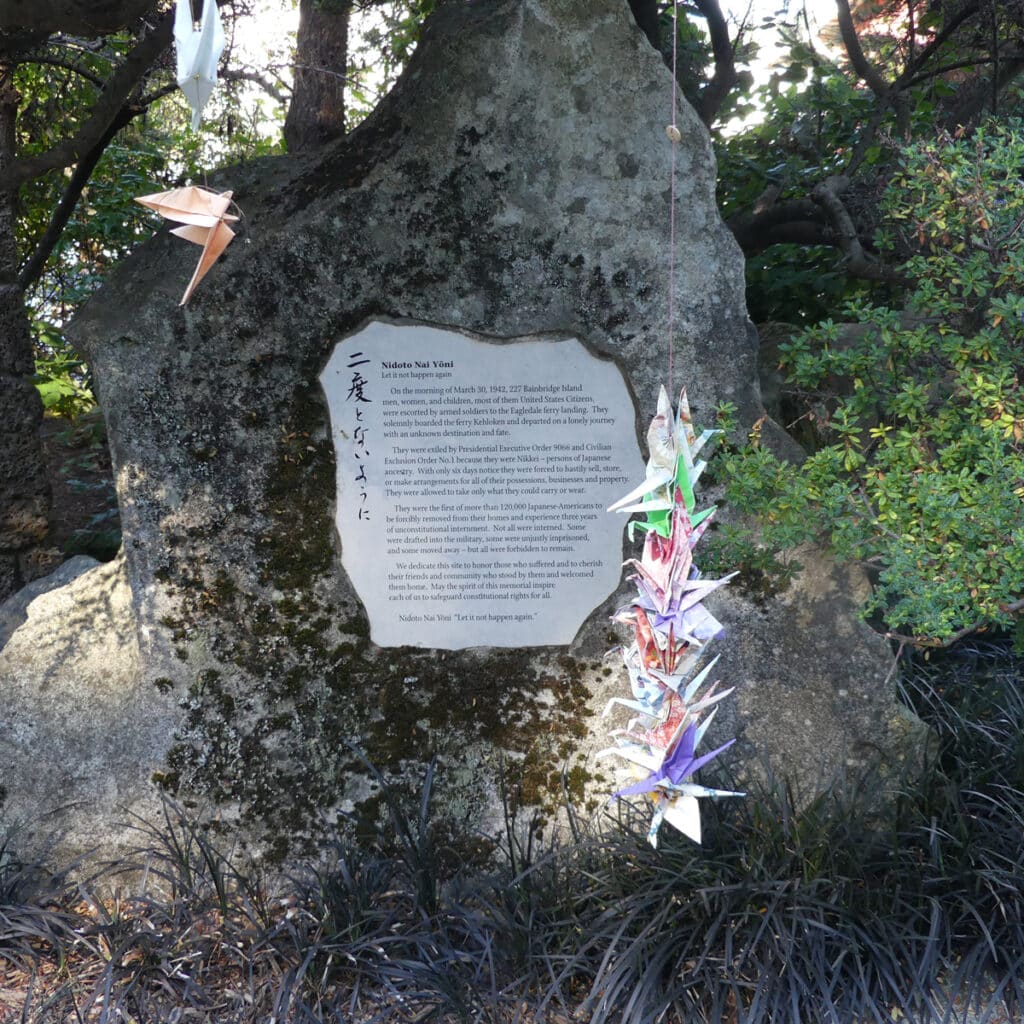 stone with plaque telling events