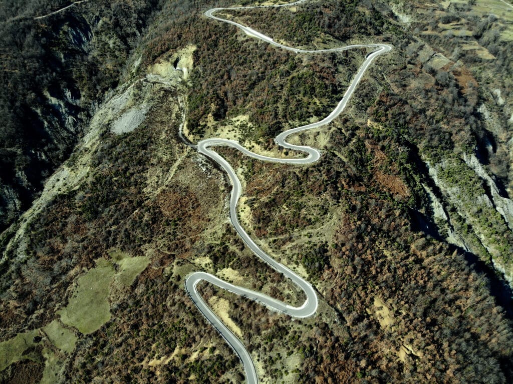Aerial view of serpentine road through the mountains between Tirana and Osum Canyon. Photo: Thomas Später 