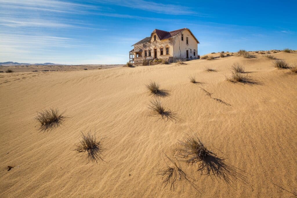 A single building in the desert ghost town of Kolmanskop Namibia