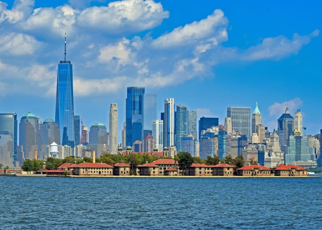 Skyline-of-new-york-Ellis-Island-viewed-from-a-boat
