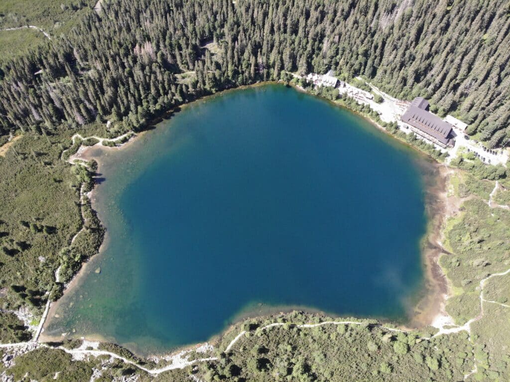 Aerial image of Popradske Pleaso, a crystal-clear mountain lake on the way up to the Ostrva lookout. Photo: Thomas Später