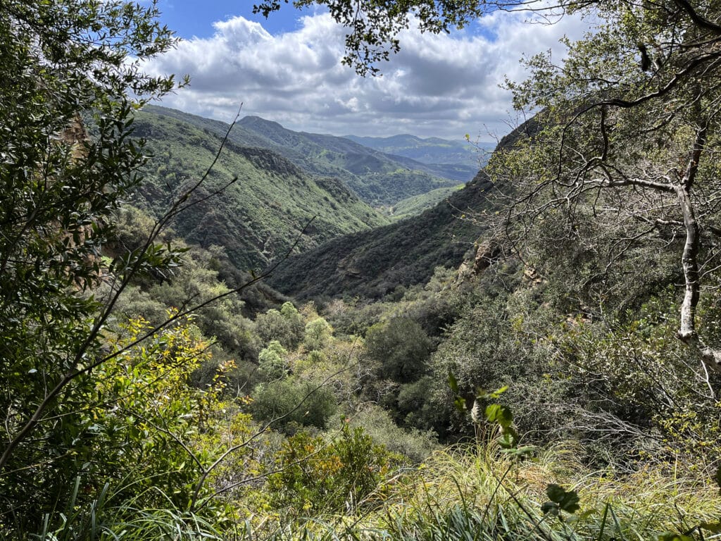 Breathtaking view of the valley when hiking to the top of the waterfall