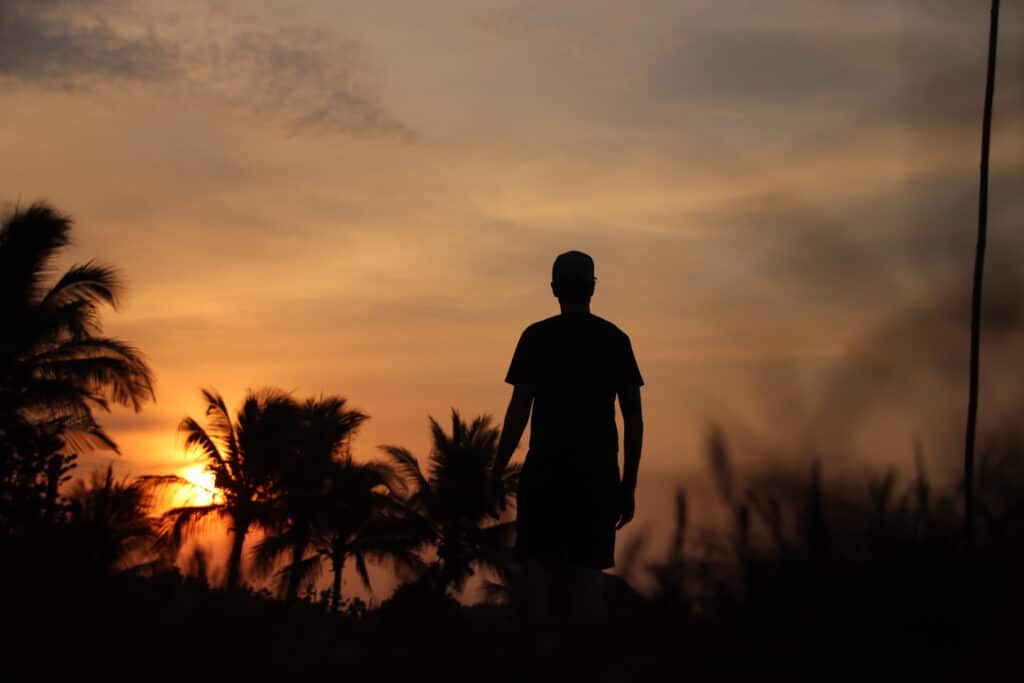 Author staring at the picturesque sunset at El Paredon beach in Guatemala. Photo: Thomas Später