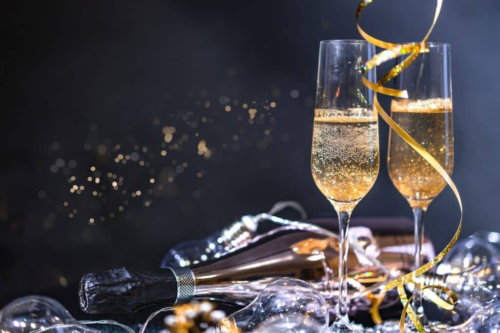 Champagne and glasses for New Year's Eve celebration